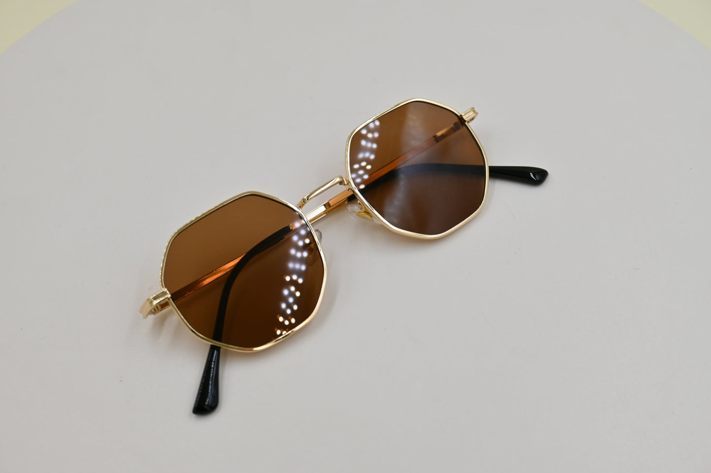 Lentes hexagonal café